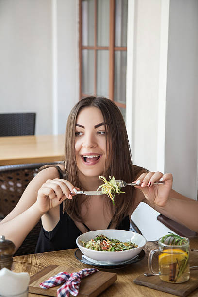 istock woman, eating tasty breakfast 588248598