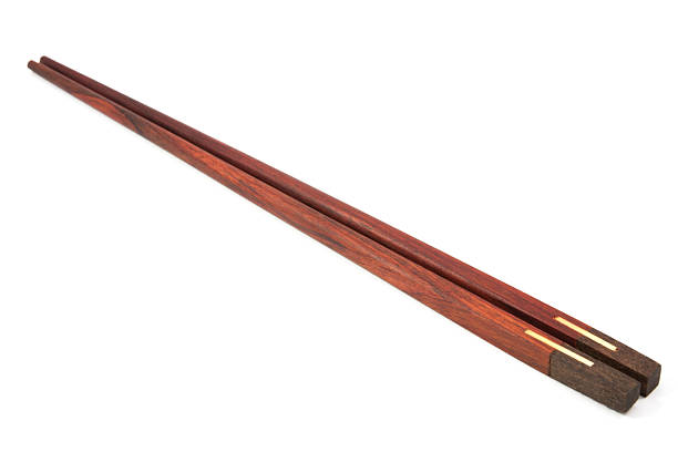 istock Wooden chopsticks on white background. 588250796