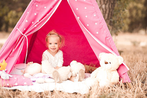 istock Girl playing outdoors 588255112
