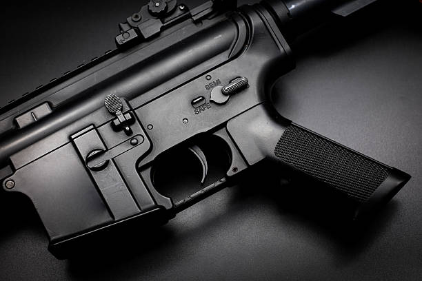 istock Assult rifle on black background 588258116