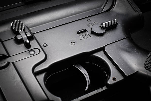 istock M4A1 assult rifle on black background 588258360
