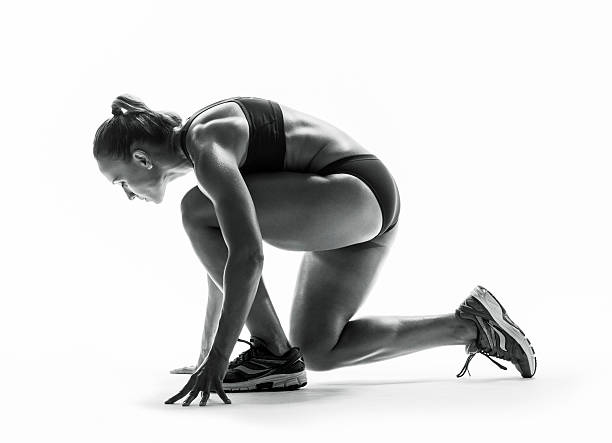 istock Fit female athlete ready for a sprint. Isolated 588258860