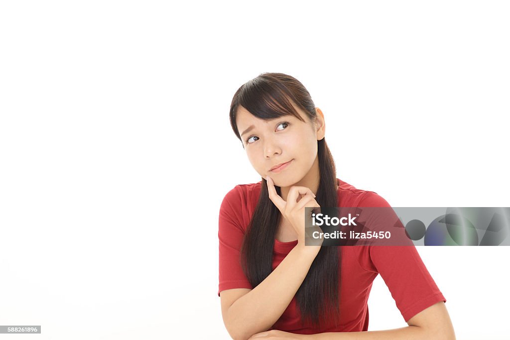 Uneasy Asian woman Portrait of a young woman Japanese Ethnicity Stock Photo