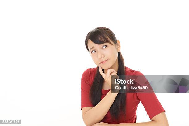 Uneasy Asian Woman Stock Photo - Download Image Now - Japanese Ethnicity, Worried, Depression - Sadness