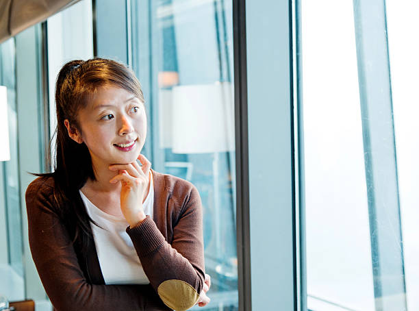 istock Attractive young asian woman 588262232