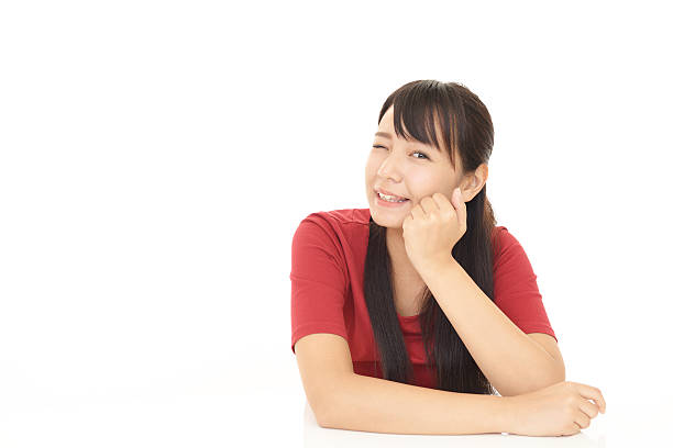 istock Smiling young woman 588262600