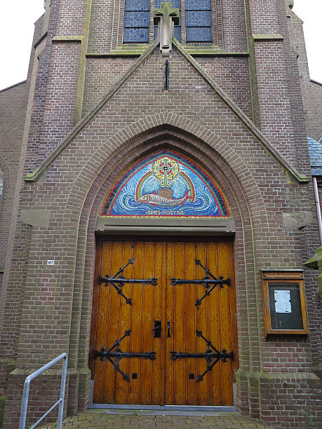 wooden Church door Zuiderkerk (South Church) or St. Pancras Church is a 15th-century two-aisled, late Gothic church in the Dutch city of Enkhuizen. enkhuizen stock pictures, royalty-free photos & images