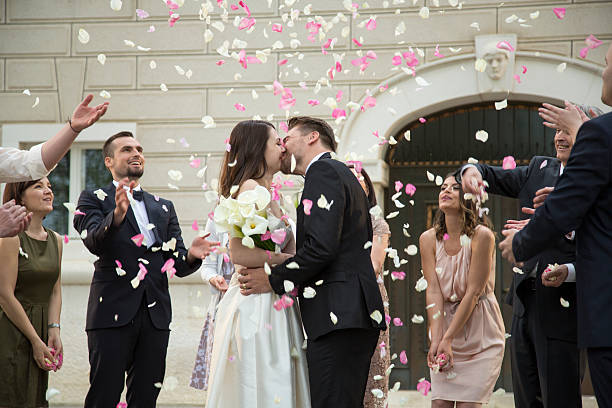 istock Bride and groom kissing 588267130