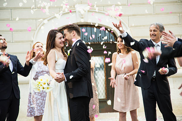 istock Bride and groom outside church 588267262