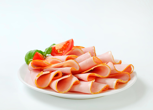 Slices of smoked ham on a plate