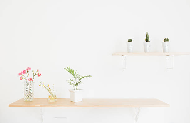 istock Decorate wood shelf with flowers 588270910