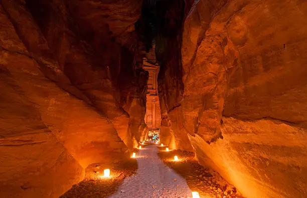 Al Khazneh in Petra, Jordan. Al Khazneh was carved out of a sandstone rock face. It has classical Greek-influenced architecture. It is known as the Treasury.