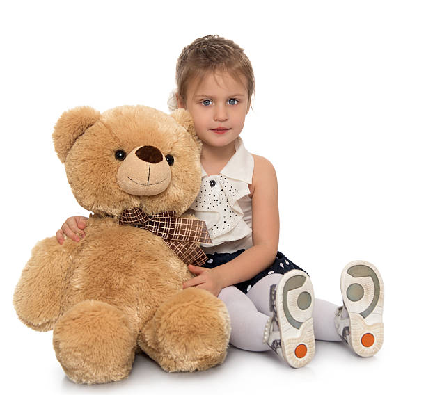 istock Girl with Teddy bear 588352086