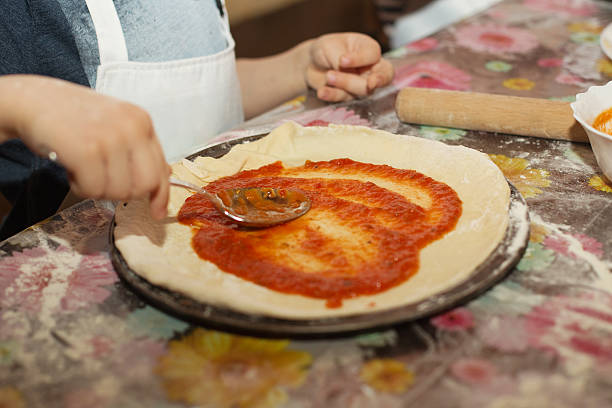 istock Master class for children on cooking Italian pizza 588352982