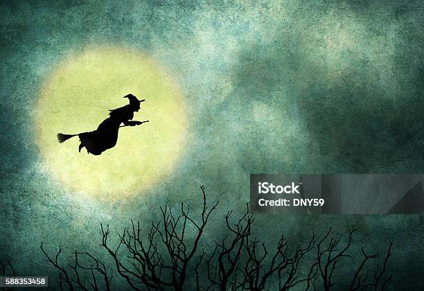 Witch Riding On Broom In Front Of Hazy Full Moon Stock Photo - Download Image Now - Halloween, Horror, Moon