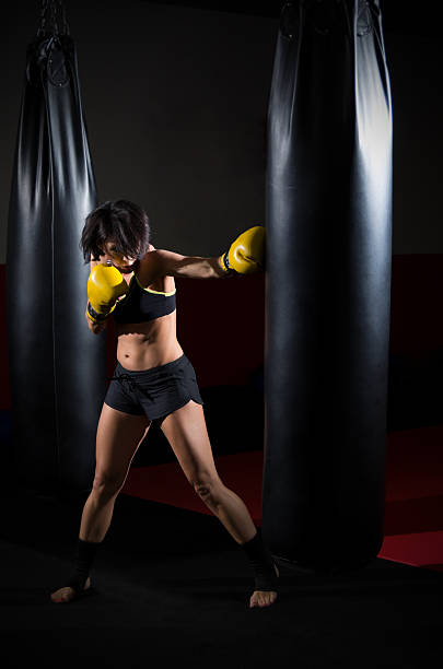 istock Training of kickboxer woman 588354282