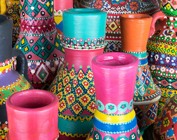 istock Composition of artistic painted clorful handcrafted pottery vases 588360210