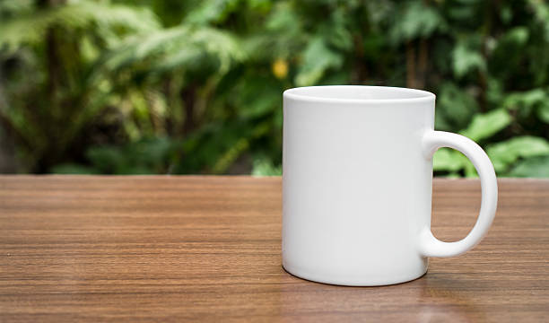 istock cup of coffee on nature 588361140