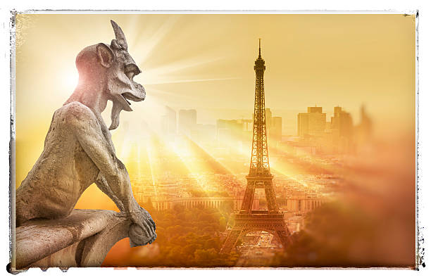 istock Gargoyle figur on Notre Dame looking towards Eiffel Tower 588361182