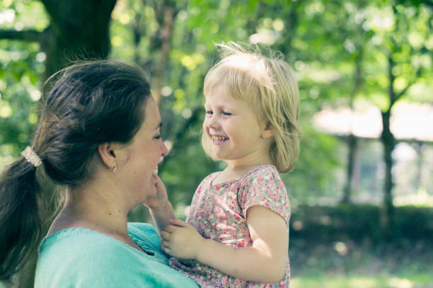 istock Cheerful Mother and her Daughter 588361548