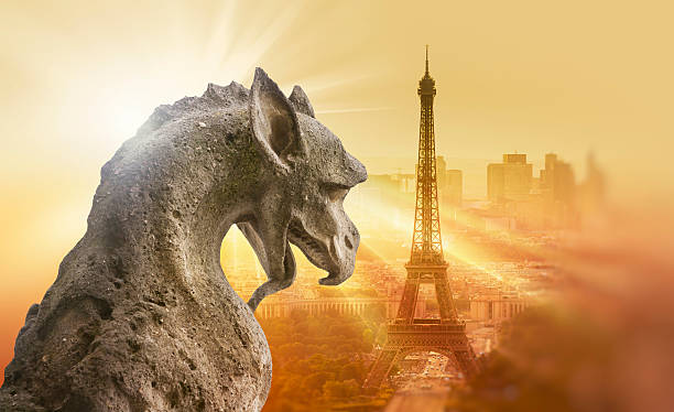 istock Gargoyle figur on Notre Dame looking towards Eiffel Tower 588361764