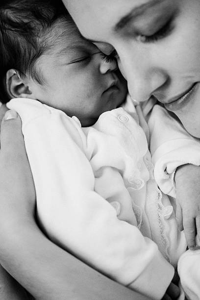 istock Newborn baby and parents 588363112