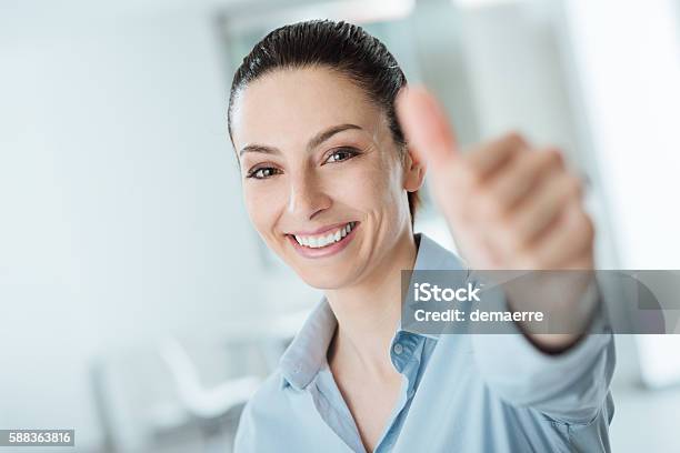 Beautiful Businesswoman Thumbs Up Stock Photo - Download Image Now - Achievement, Adult, Adults Only