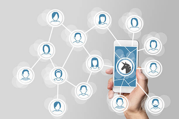 istock Silicon valley unicorn concept with hand holding smartphone 588365786