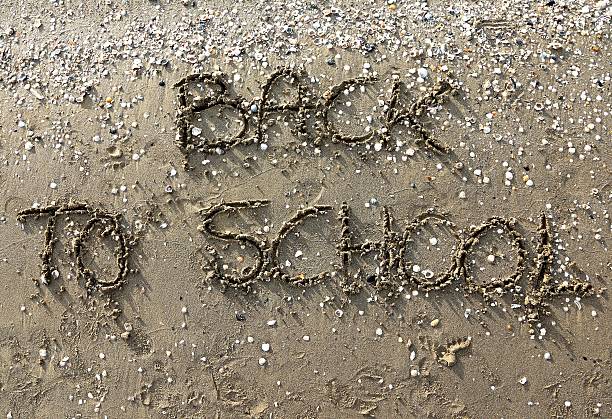Back to School big written on the beach