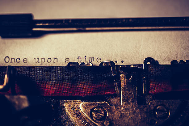 'once upon a time' typed using an old typewriter - typewriter typebar old macro imagens e fotografias de stock