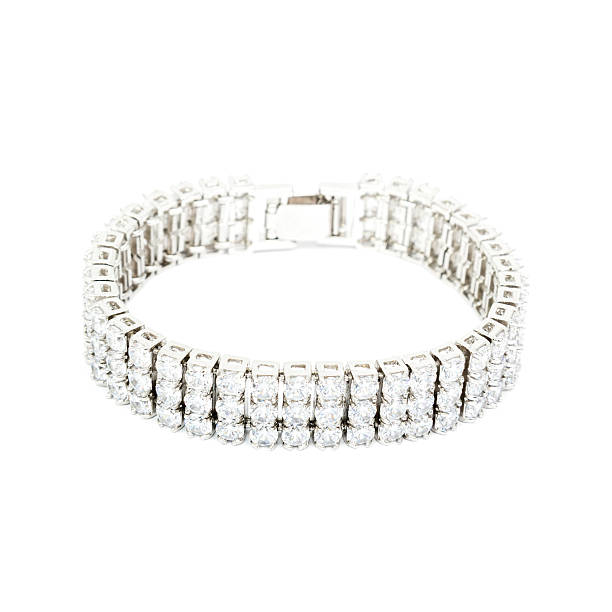 istock Silver diamond bracelet isolated on white 588368134