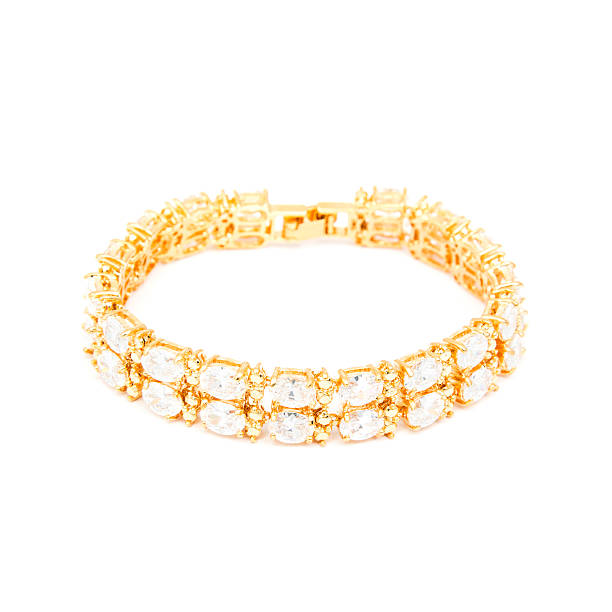 istock Golden diamond bracelet isolated on white 588368166