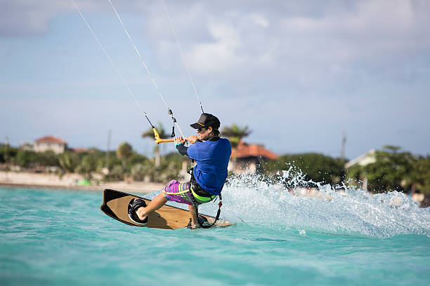 istock Kite Surfing Man In The Caribbean 588369640