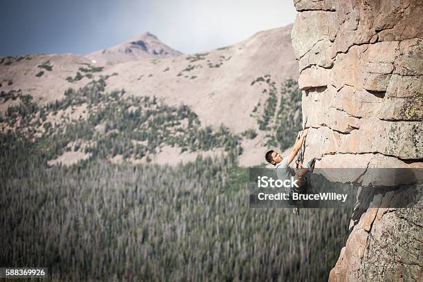 Asian Man Rock Climbing Stock Photo - Download Image Now - Adrenaline, Adventure, Asian and Indian Ethnicities