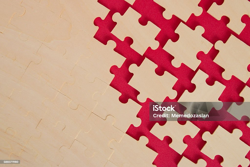 puzzle background on red Mergers and Acquisitions Stock Photo