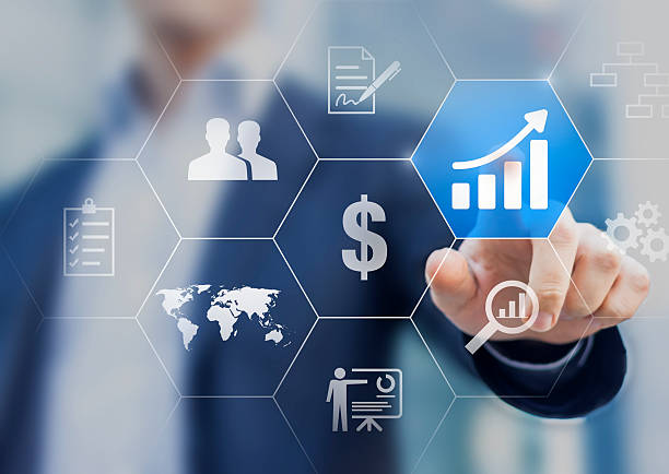 Boost your business concept. Successful businessman choosing to increase profit Boost your business concept. Businessman touching buttons with solutions to increase profit and get success growth in sales stock pictures, royalty-free photos & images
