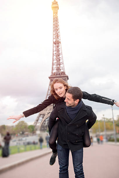 istock Happy young couple in Paris 588374334