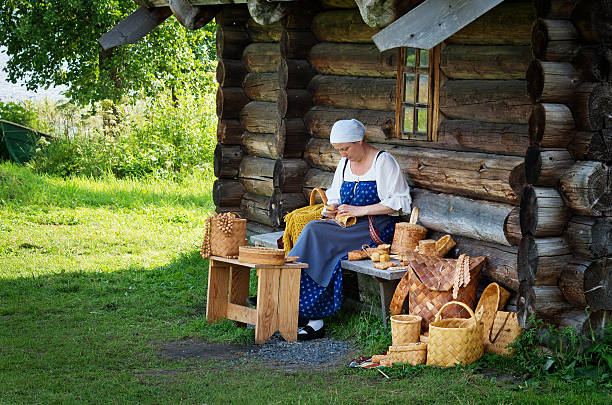 Women in traditional russian costume on Kizhi island, Karelia, stock photo