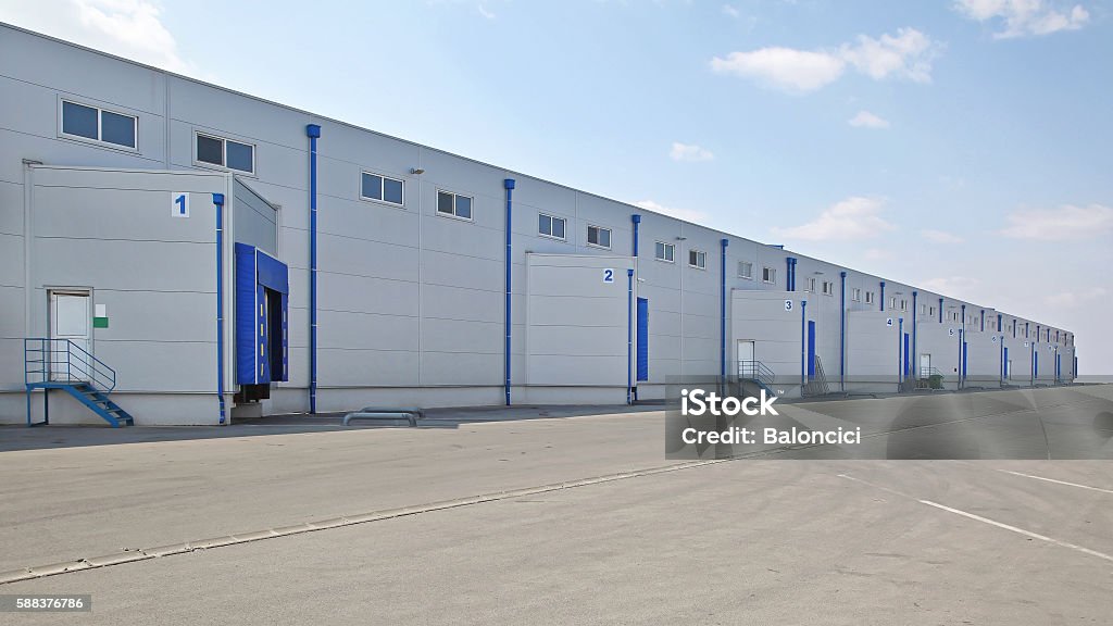 Loading Docks Loading Bay at Long Distribution Warehouse Buildin Commercial Dock Stock Photo