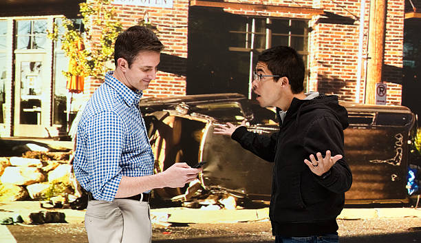 istock Two people quarreling in front of 588377142