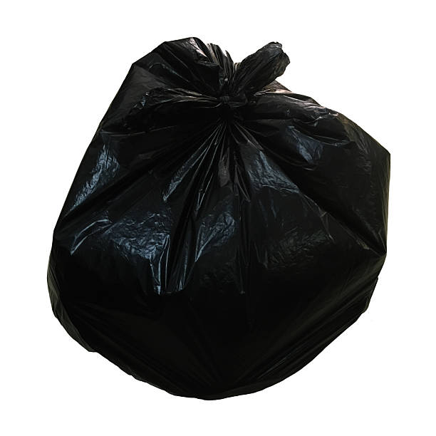 istock close-up of a full garbage bag isolated white background 588379700