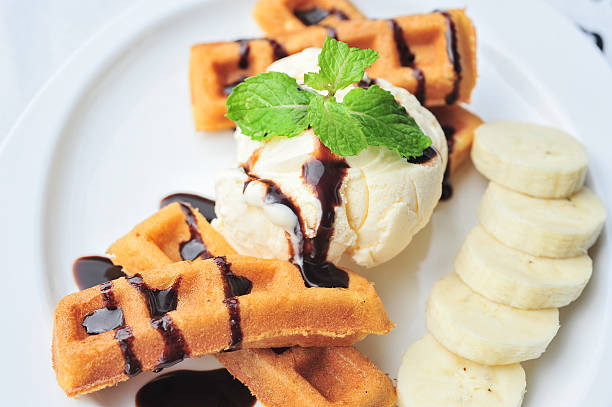 istock vanilla ice cream waffle with bananas 588386166