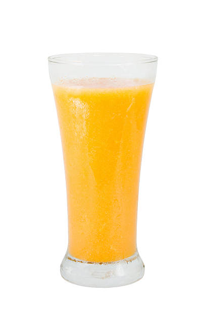 istock orange and mango juice  in a glass 588386966