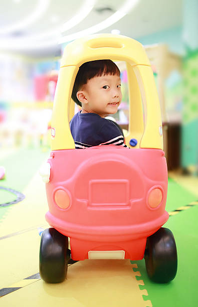 istock Cute children playing in the playground 588388496