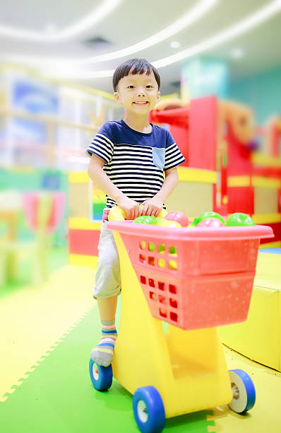 istock Cute children playing in the playground 588388980
