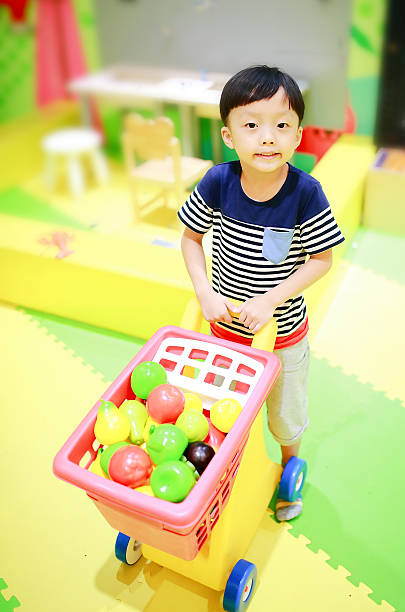 istock Cute children playing in the playground 588389002