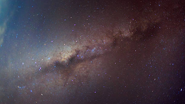 istock Abstract milky way in the night sky background 588389252