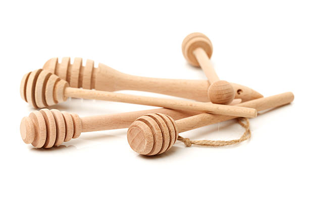 istock wooden honey stick 588389632