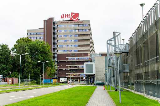 Amsterdam, The Netherlands - August 12, 2016: Academic Medical Centre (AMC) in Amsterdam. AMC is the largest hospital in Amsterdam and affiliated to the University of Amsterdam. It's currently merging with the other academical hospital in Amsterdam, VU University Medical Centre.