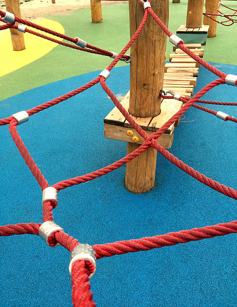 istock Set of net crawl constructions on kids playground 588392088